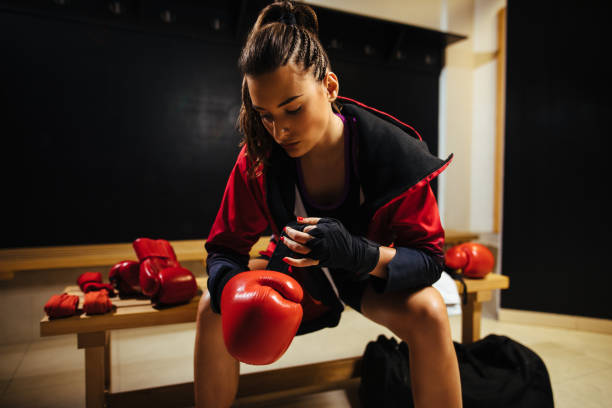 istock Young woman preparing for the muay thai workout 1137367913
