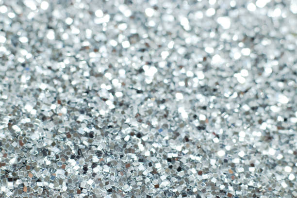 istock Silver glitter texture. Festive sparkling sequins background. Wpaper for Valentine, New Year or Christmas Holidays 1137368905