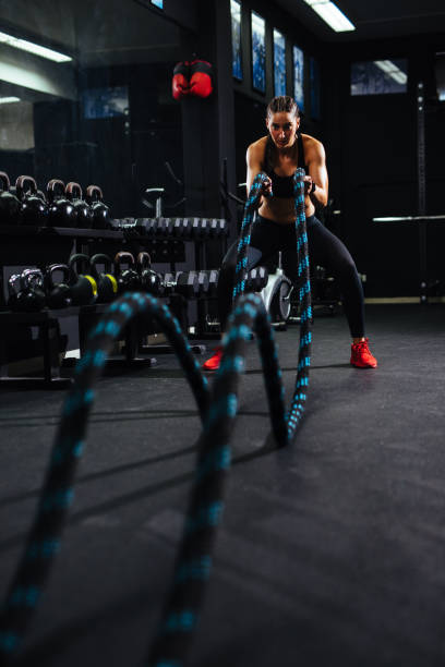 istock Battle ropes session at the gym 1137369408