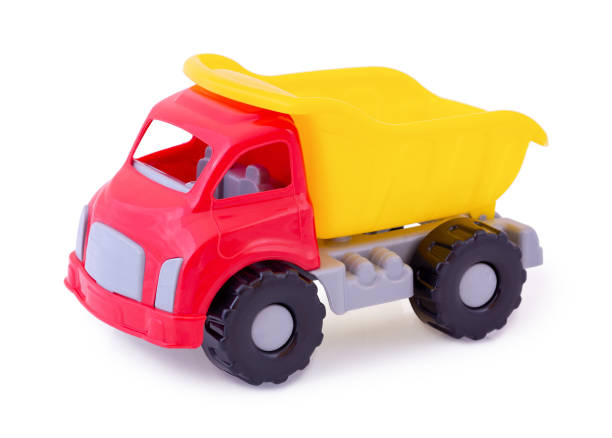 istock Vintage dump truck isolated on white background with shadow reflection. Plastic child toy on white backdrop. Dump tipper truck lorry construction vehicle. Children's toy. Kid's plaything. 1137375772