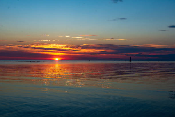istock calm sunset with no wind on the lake 1137380919