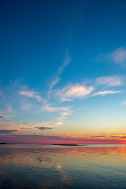 istock calm sunset with no wind on the lake 1137380920