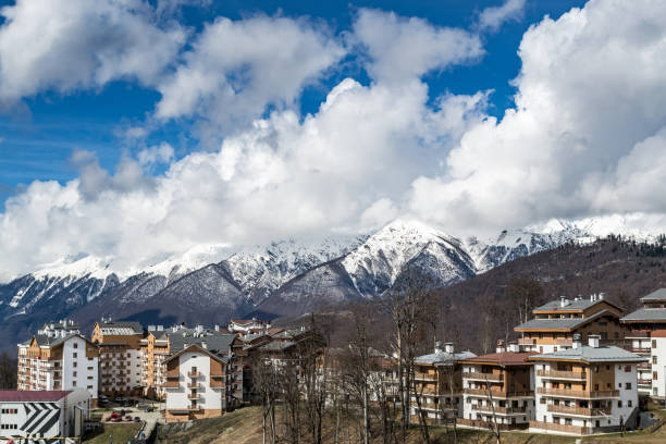 istock Sochi Olympic village Rosa Khutor snowy mountains in the background 1137384113
