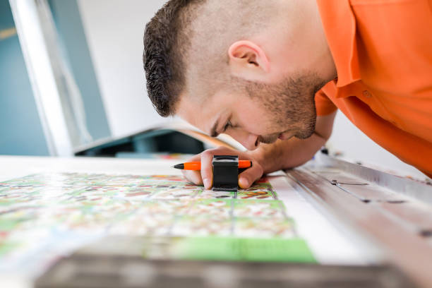 istock Man working in printing factory 1137390946