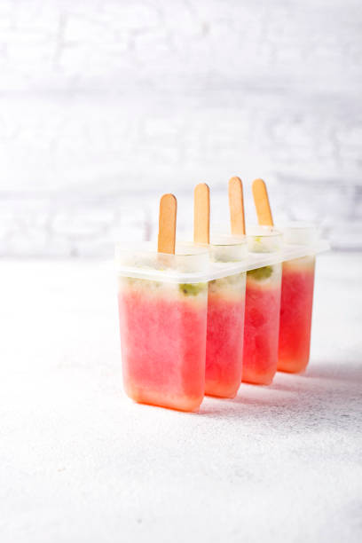 istock Homemade popsicles in shape of watermelon 1137396121