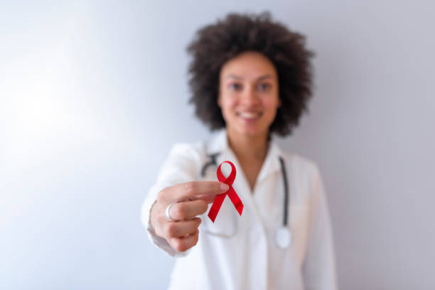 istock Female doctor with red ribbon. 1137399656