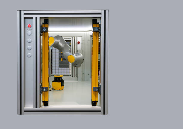 istock Robot display in metal cage, an industrial robotic arm 1137400358
