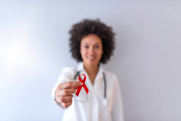 istock Female doctor with red ribbon. 1137400360