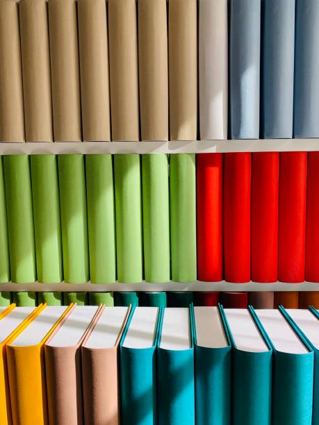 istock Colorful generic books in white shelves 1137400845