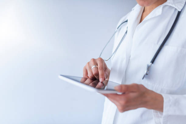 istock Unrecognizable Doctor using digital tablet in hospital 1137400916