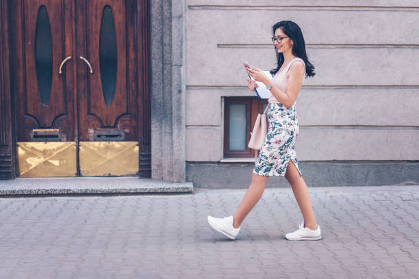 istock Woman chatting on-line on her phone 1137403540