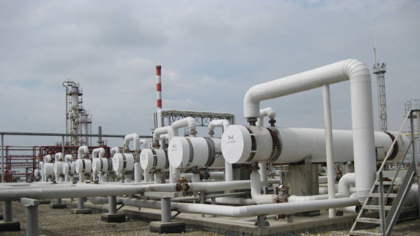 istock Heat exchangers at oil refinery. 1137404810