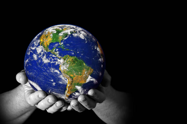 istock Hands holding the Earth with North America visible 1137404964