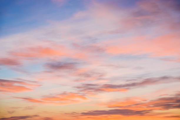 istock Stunning sunset sky and orange clouds background. 1137408635