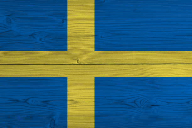 istock Sweden flag painted on old wood plank 1137411918