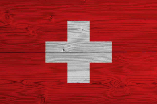 istock Switzerland flag painted on old wood plank 1137411924