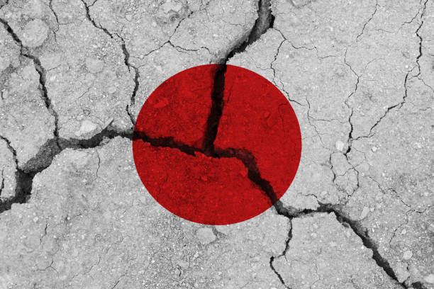 Japan flag on the cracked earth Japan flag on the cracked earth. National flag of Japan. Earthquake or drought concept waterless stock pictures, royalty-free photos & images