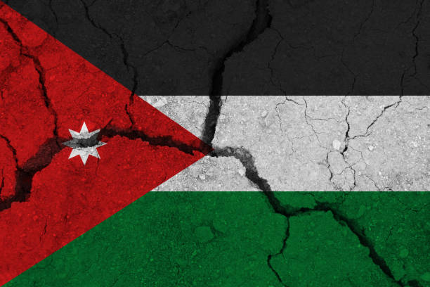 istock jordan flag on the cracked earth 1137412078