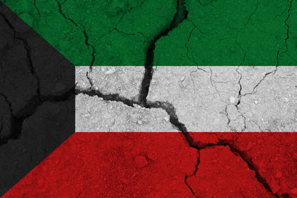 istock kuwait flag on the cracked earth 1137412079