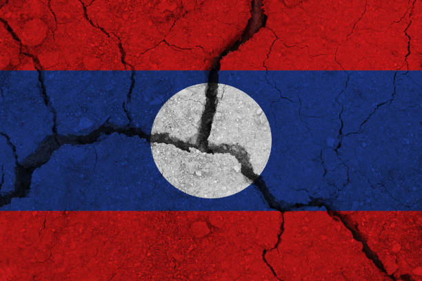 istock Laos flag on the cracked earth 1137412082