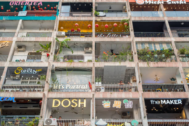 Ho Chi Minh City, Vietnam - January 8, 2019: the Cafe Apartment, a multistory building on Nguyen Hue Street turned into a cafes' hub.