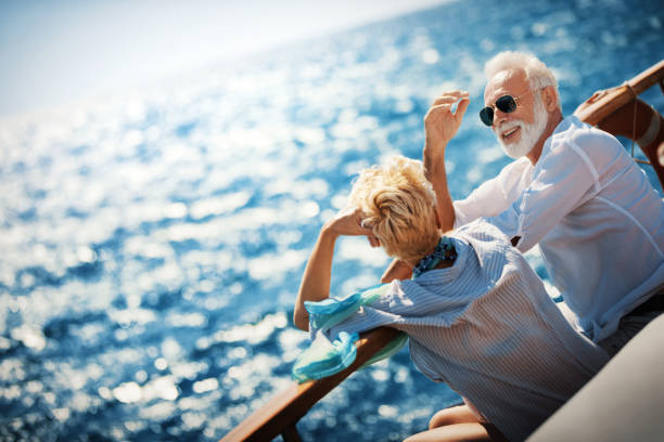 istock Senior couple on a sailing cruise. 1137426640