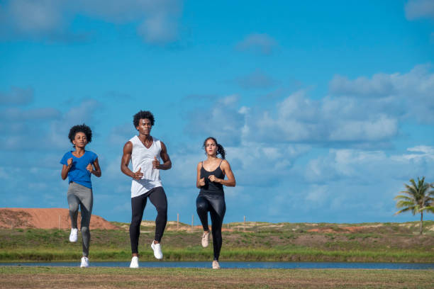 istock Three young brazilians making gymnastic outside 1137426776