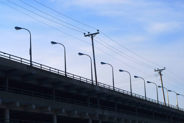city floor parking lot lights in a row sky electric pole lamps