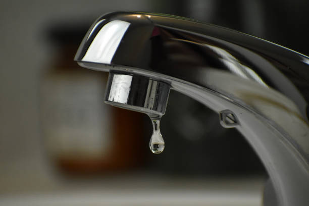 istock faucet with drop of water 1137432931