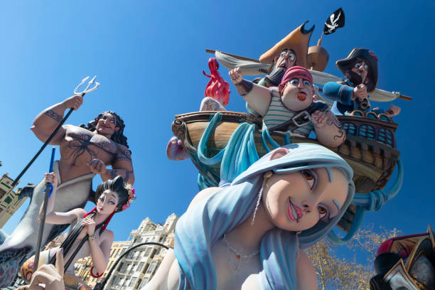 Valencia, Spain - March 14, 2019: Temporary colorful sculptures during the Las Fallas days. The Fallas is a traditional celebration held in commemoration of Saint Joseph in the Valencia city. This monuments are burnt during the celebration.