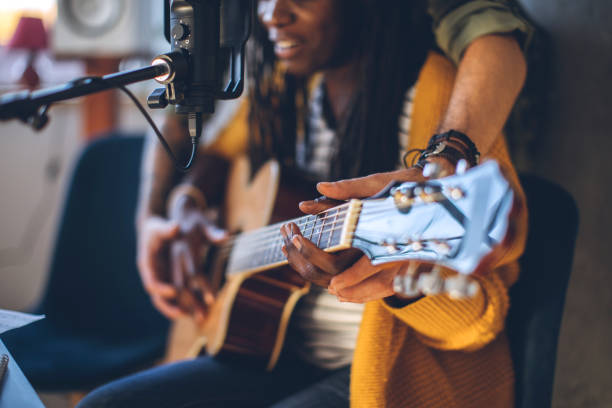 istock African woman on guitar class 1137437944