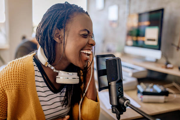 istock Female host on radio station 1137439032