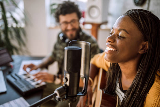 istock Backup singer singing in music studio 1137441558