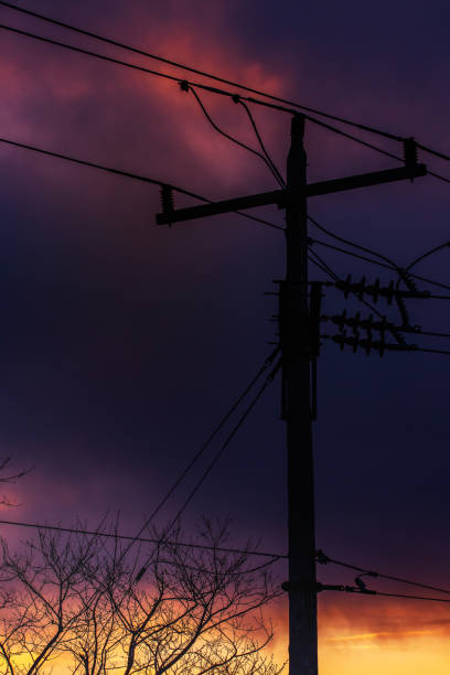 istock Utility Pole and Stormy Clouds At Sunset 1137442267