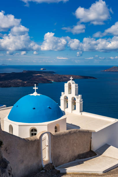 istock Traditional blue domed chapel in Santorini Greece 1137443350