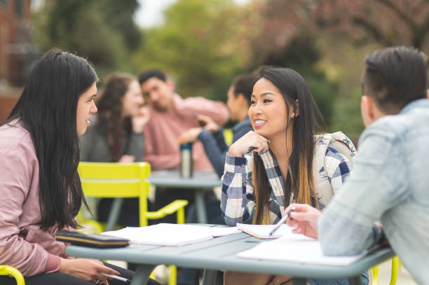 istock College students studying at an outdoor table 1137445721