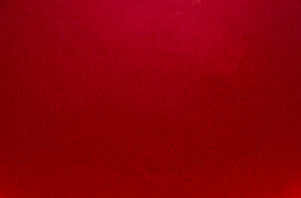 istock Beautiful red paper background. Empty space concept.Red paper texture background. Colored cardboard fibers and grain. 1137446538