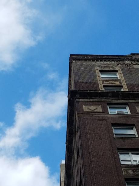 istock Corner of building rooftop with sky 1137446701