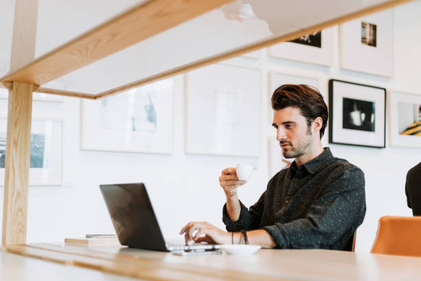 istock Casual man working in a cafe 1137460482
