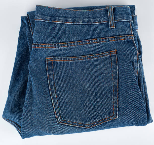 istock folded blue men's jeans on a white background 1137462144