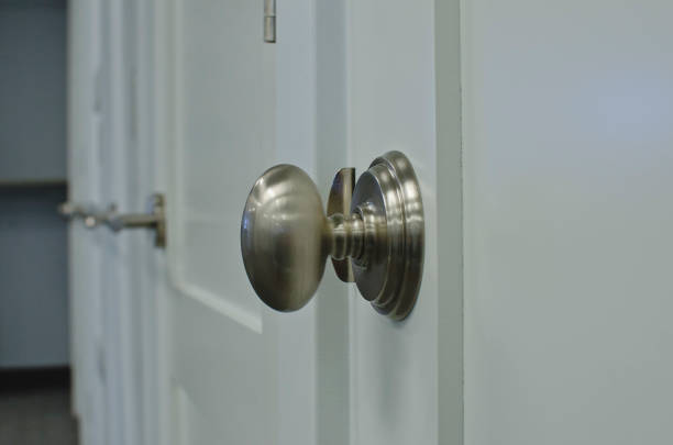 istock A silver know on the showroom doors 1137462214