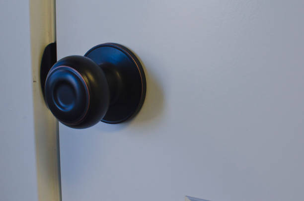istock A new door and round bronze knob 1137462843