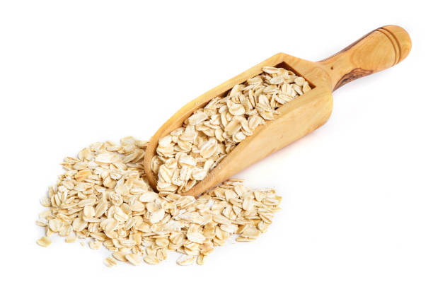 istock Whole oatmeal on wooden scoop 1137462871