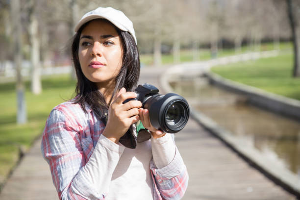 istock Pensive focused photographer shooting landmarks 1137462988