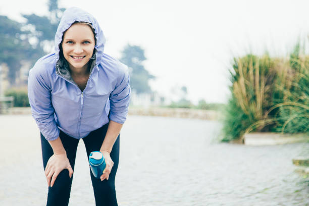 istock Cheerful jogger catching breath 1137465369