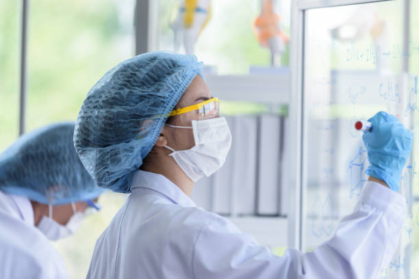 istock Asian young girl student scientist researching  and learning in a laboratory. 1137465589