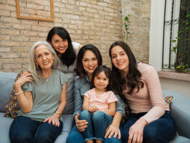 Generations of women from the same Mexican family stock photo