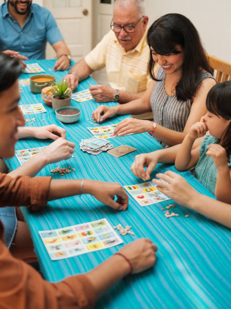 istock Cheerful Mexican family playing games 1137469612