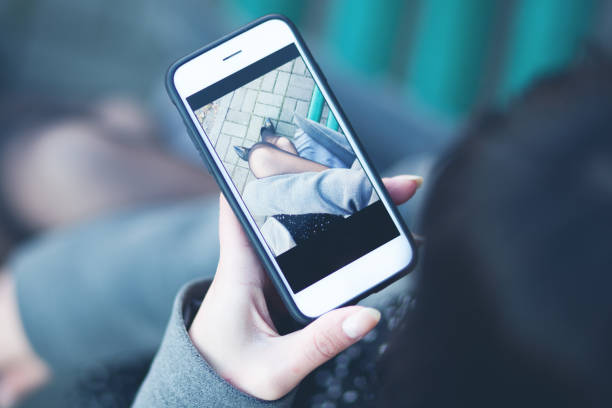 istock young woman hand holding  phone 1137469690