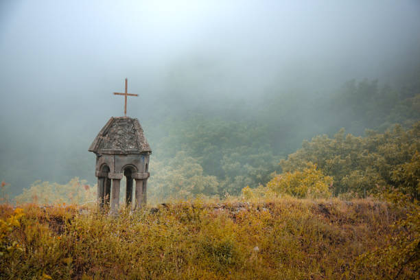 istock church cross in forest with fog 1137469710